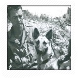 Vintage photograph of a handler and his K9 partner in the field
