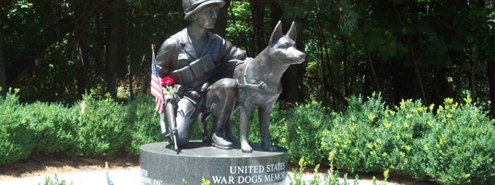 The United States War Dogs Memorial statue, honoring K9 handlers and their dogs